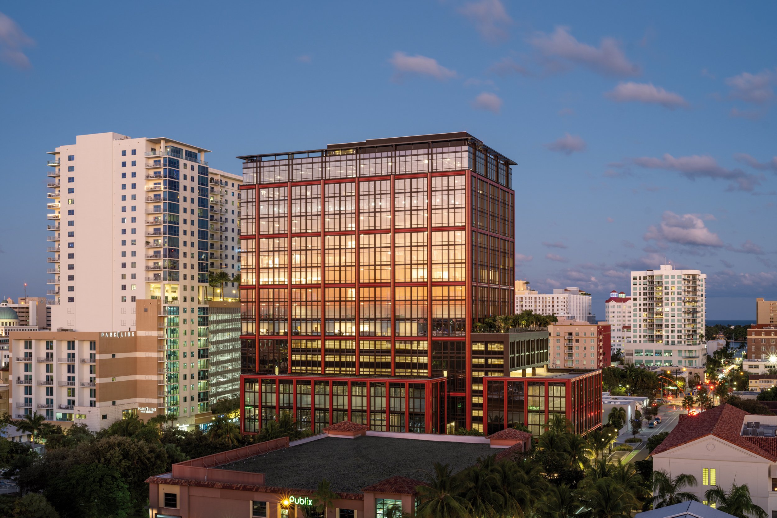 A highrise building at dusk.