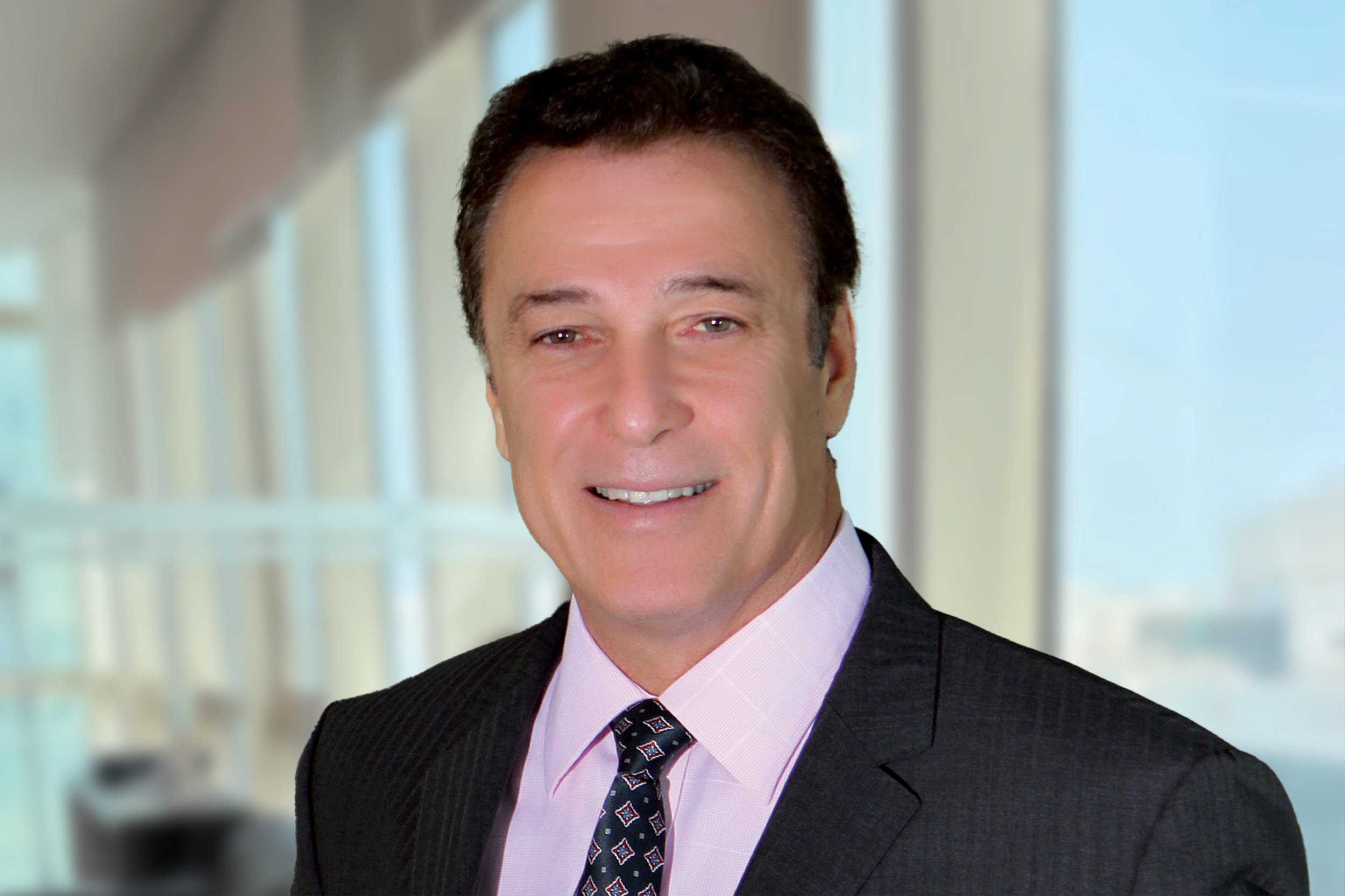 Portrait of Mahdi Mansour, senior director for the Middle East