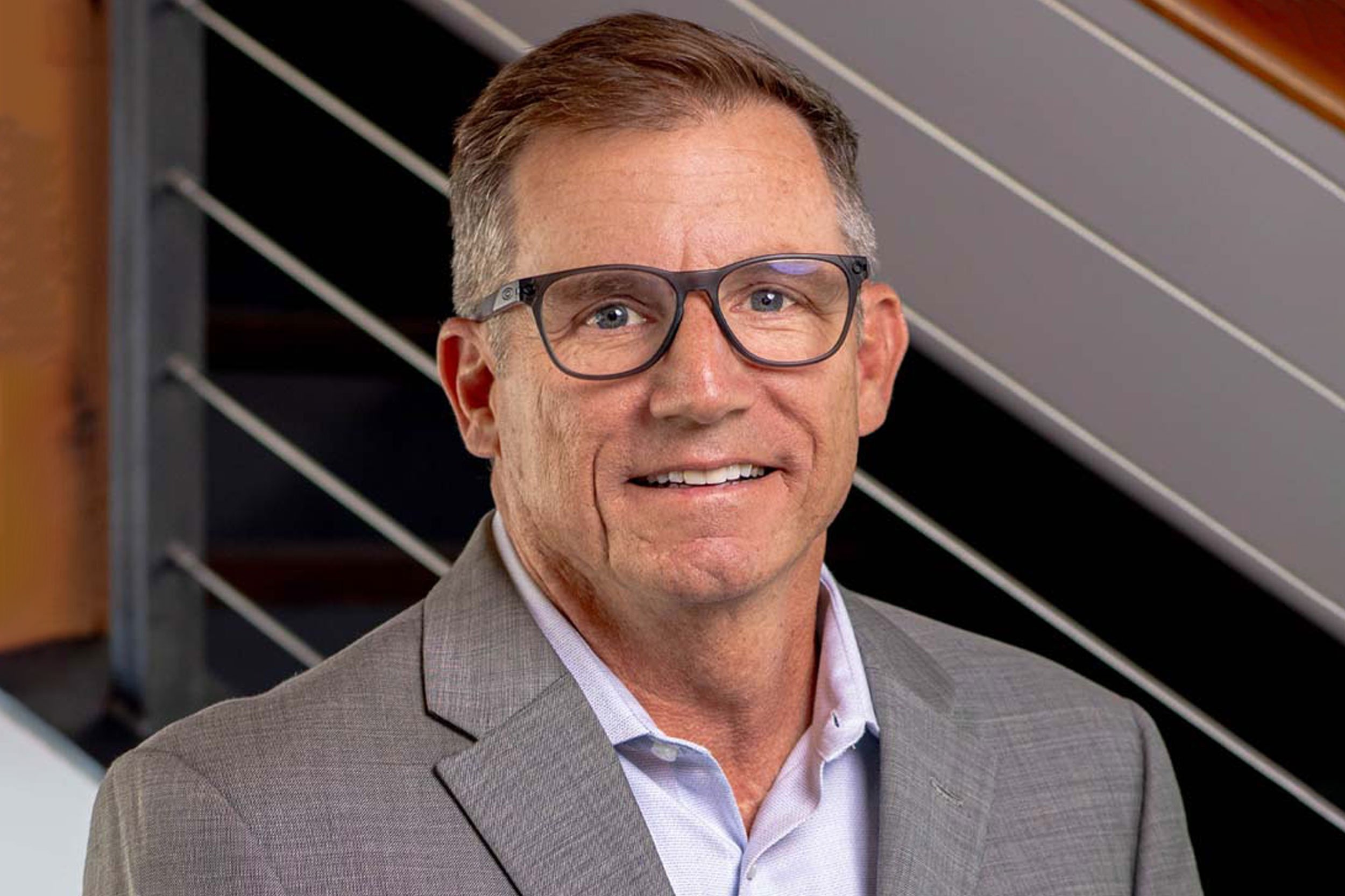 Mike Asaro in grey sport coat